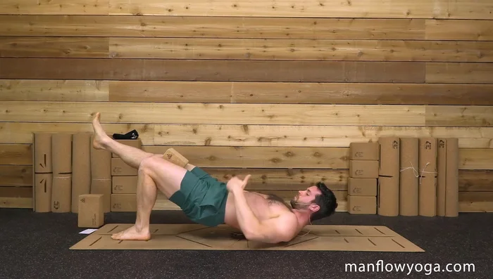 Repeat on the other side. For a greater challenge, lift your arms.