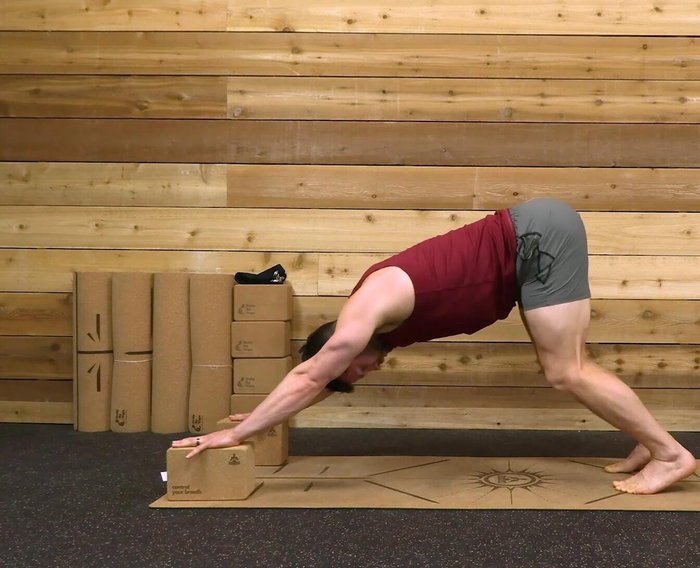 Focus on lengthening through the backs of your thighs and hamstrings.