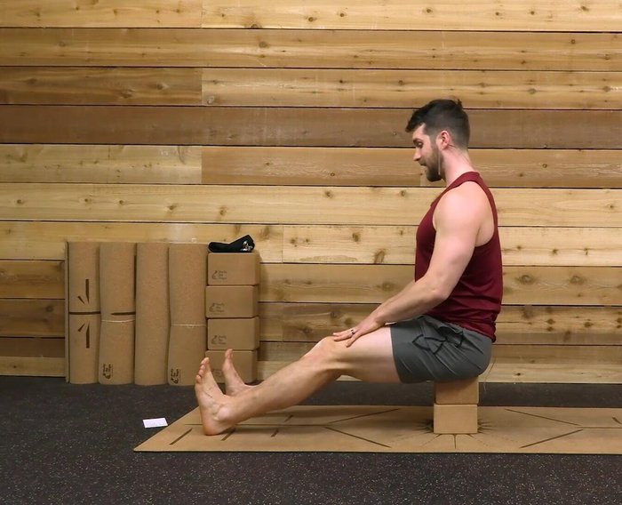 Maintain an upright posture, slight bend in knees.