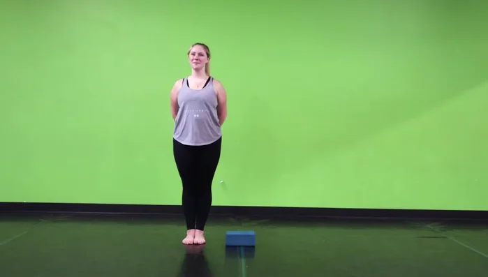 Place your entire foot on a yoga block.