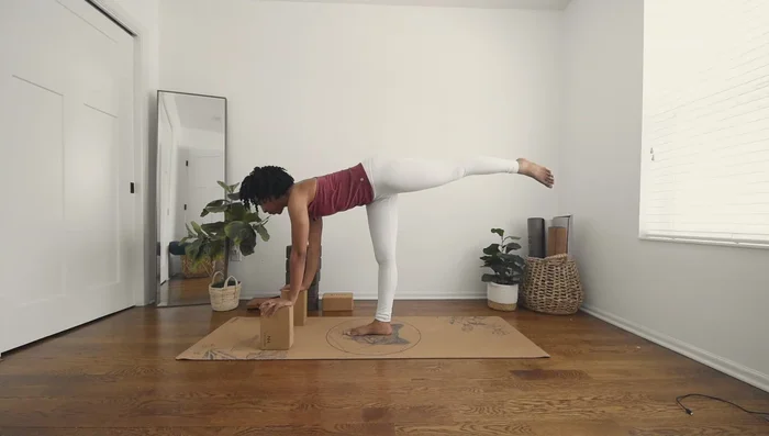 Engage your core and maintain balance.