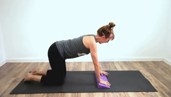 Wrist and Knee Support in Tabletop Pose: Place the wedge under your hands (or knees) to reduce wrist (or knee) strain in tabletop pose.