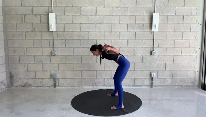 Bend and straighten legs three times to target hamstrings.