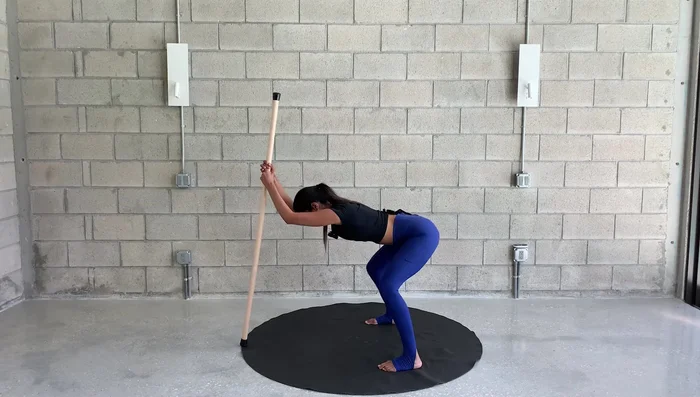 Bend and straighten legs three times to target hamstrings.