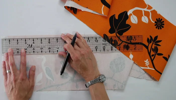 Baste the pleats: Use your sewing machine to baste the pleats down. Iron the pleats flat.