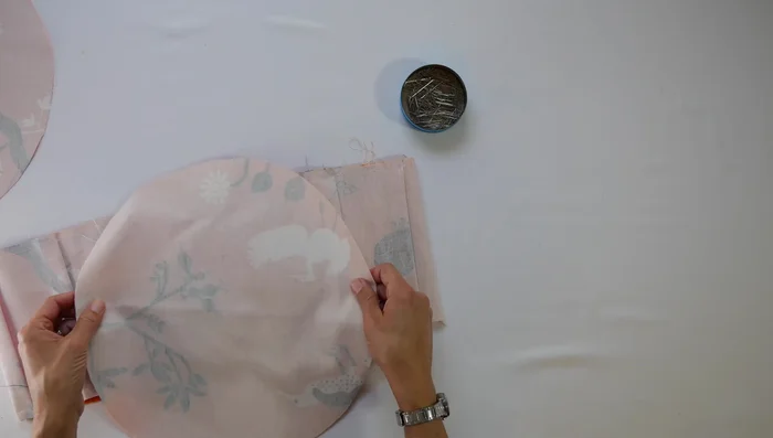 Sew the side to the top/bottom: Sew the pinned edges together using your sewing machine, using a 1/2 inch seam allowance. Press the seam flat.