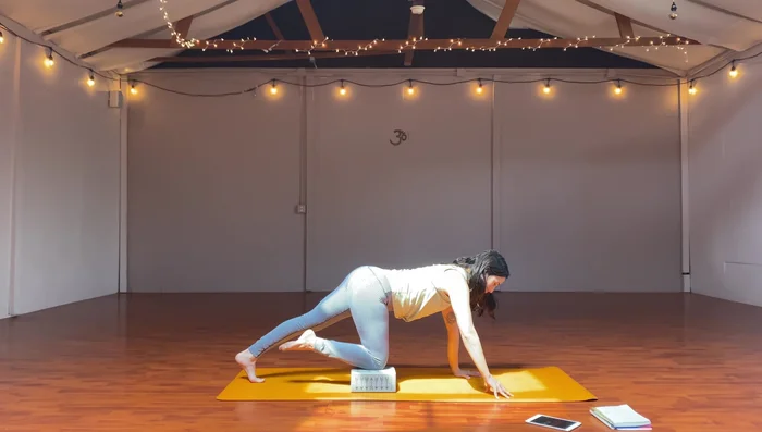 Spread your arm and leg to the sides.