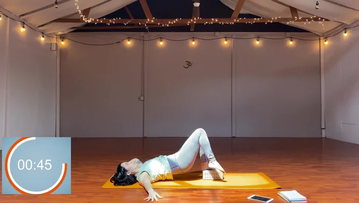 Add side twisting crunch (oblique crunch).