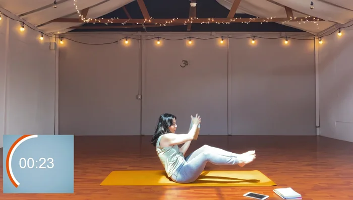 Add Russian twist (block from hip to hip, knees in opposition).