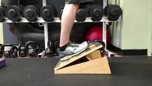 Double Duty Calf Stretch: Wall & Slant Board Techniques