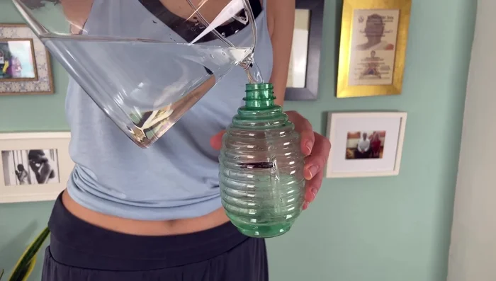 Mix three parts water and one part white vinegar. Optionally, add a few drops of tea tree oil (but avoid this for Jade mats).