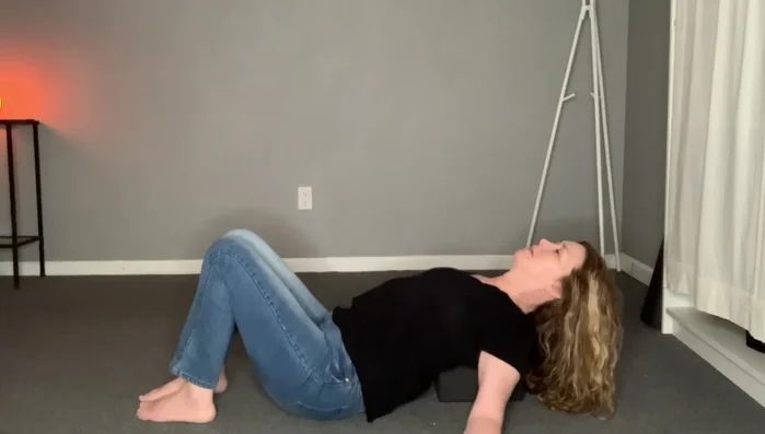 To come out, bring your knees to your chest. This will help pull your feet towards the ground. Bring your arms alongside your body, tuck your chin to your chest, and gently roll to the side.