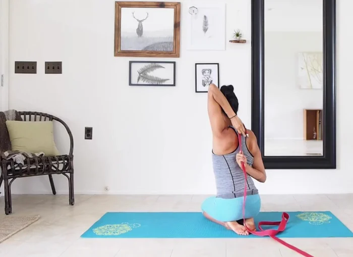 Continue until you feel a stretch in your shoulders.