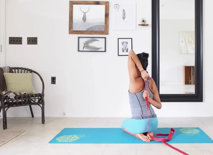 Continue until you feel a stretch in your shoulders.