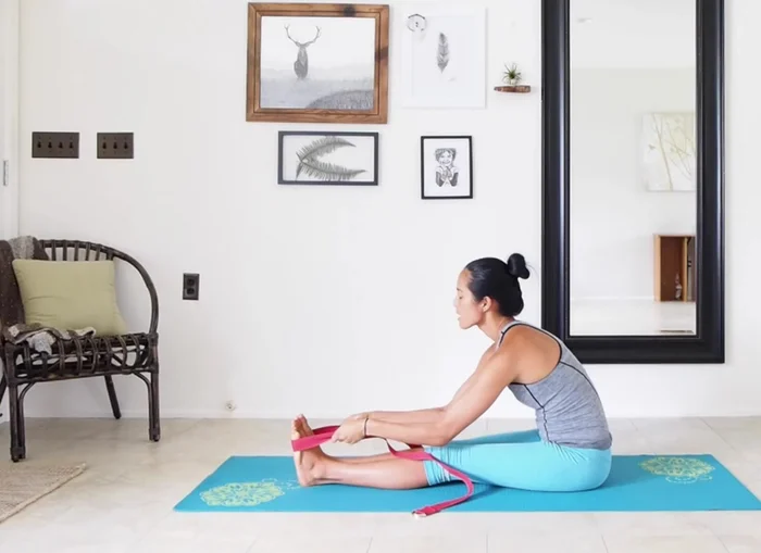 Relax into the stretch, focusing on maintaining proper posture rather than reaching excessively.