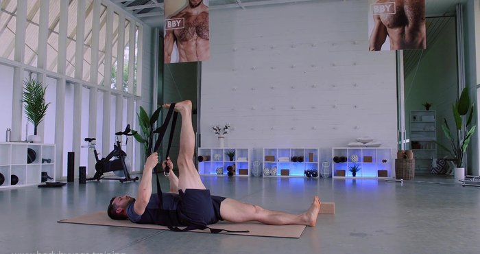 Exhale to straighten leg closer to face.