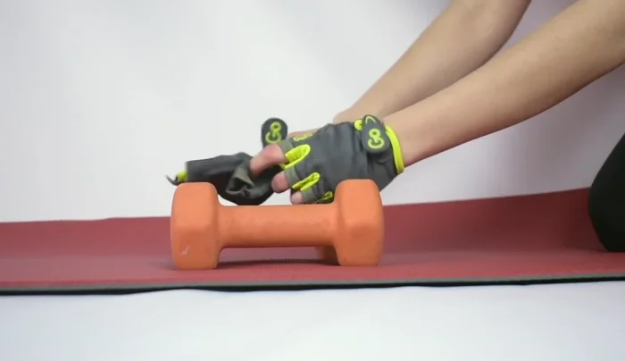 Hand wash your workout gloves with a dab of soap, focusing on the inside.