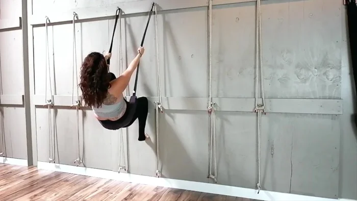 Step back to a standing position.