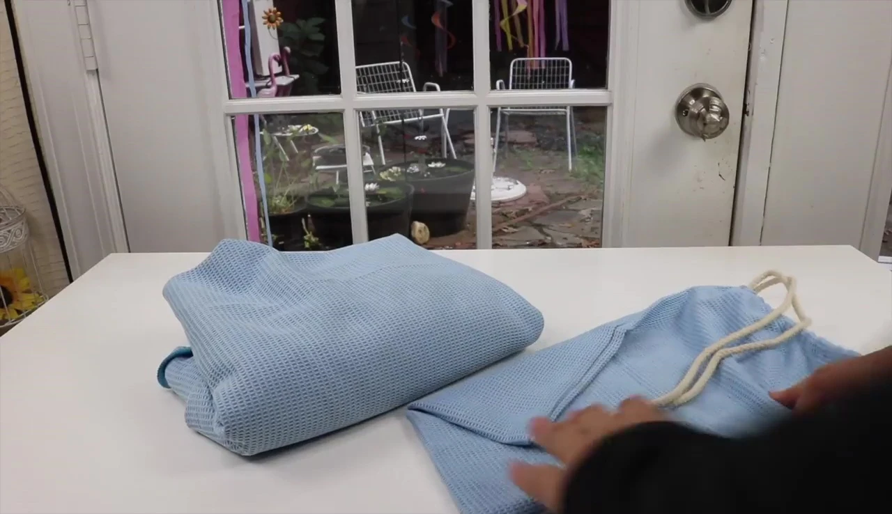 Folding the towel