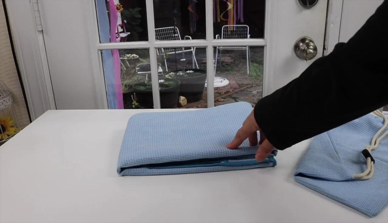 Using the towel at a yoga studio