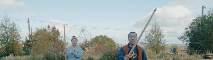 Inhale & Expand: Inhale, expanding your chest and raising your hands to the height of your shoulders.