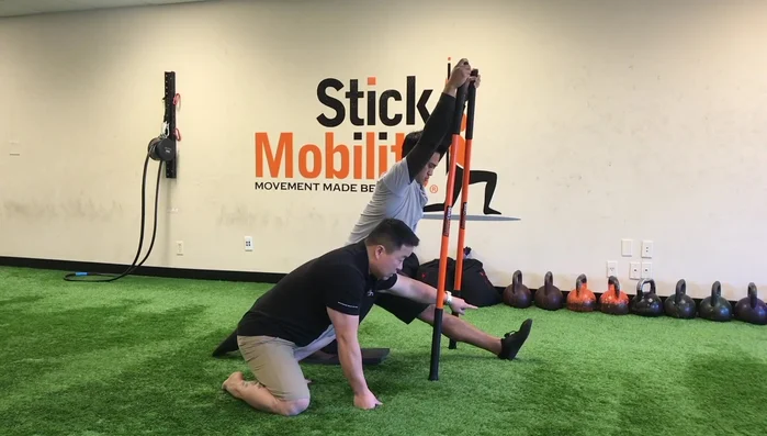 Hinge your hips backward, dorsiflex your lead ankle, and feel the hamstring stretch all the way up the leg. Hold for 6-10 seconds.