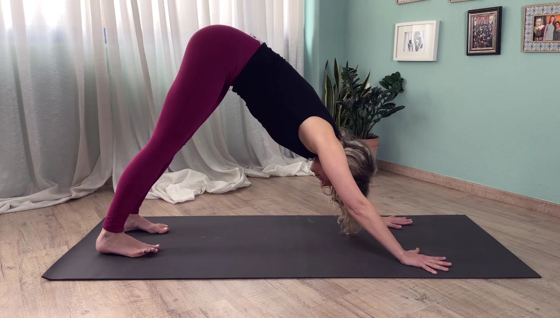 The reviewer in downward-facing dog demonstrating the grip