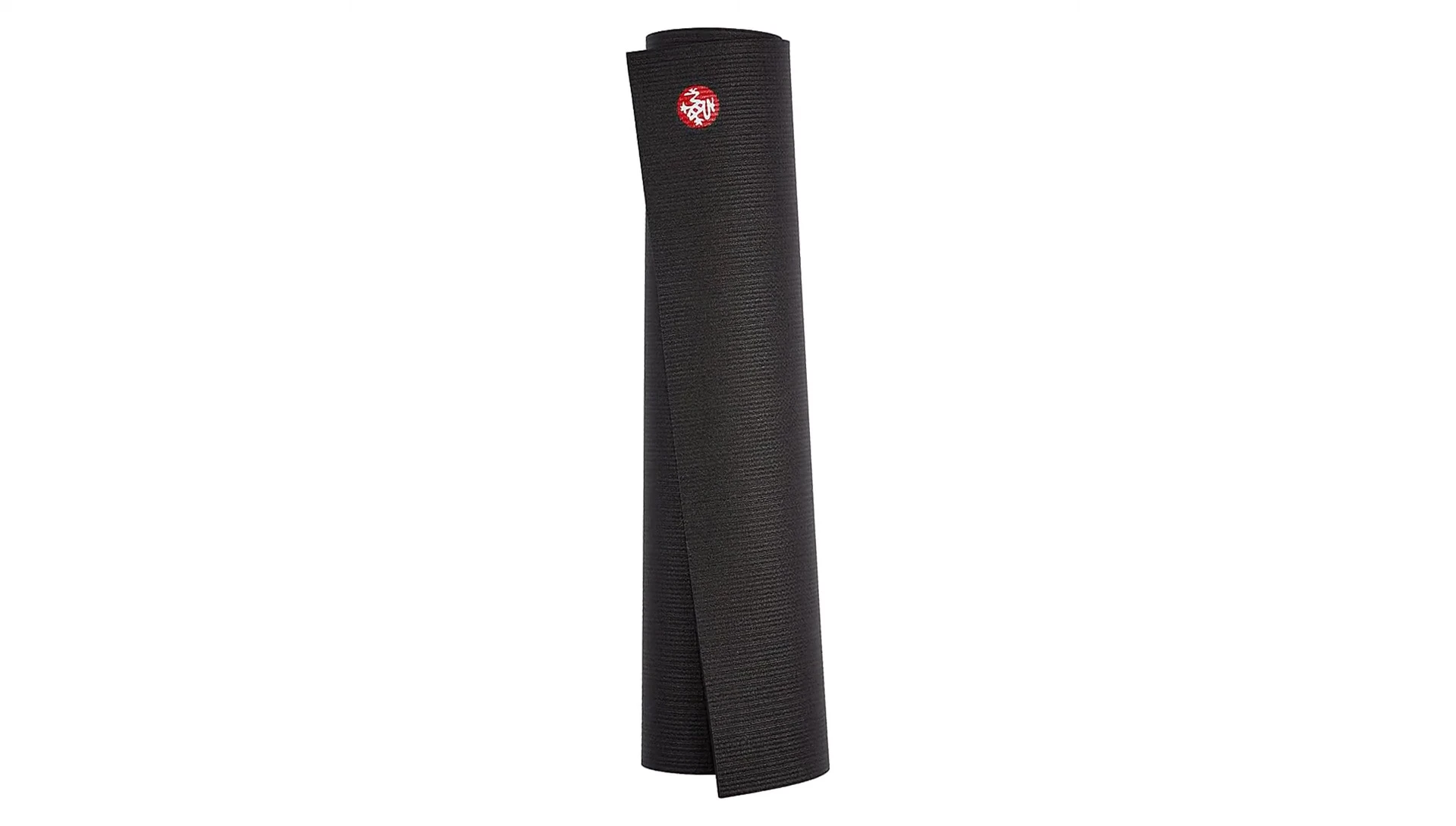 Someone doing a yoga pose on the Manduka Pro mat.