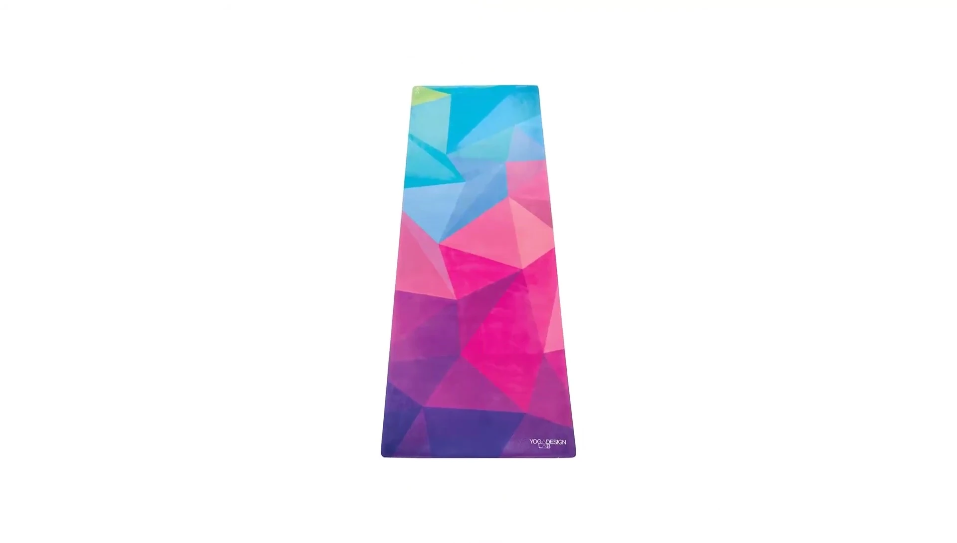 Person practicing yoga on the Yoga Design Lab mat.