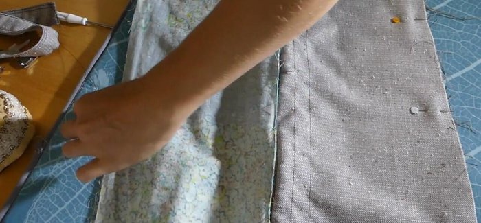 Sew the pouch: Put the outer fabric panels together (right sides facing) and sew down the long end opposite the zipper. Repeat for the lining pieces.