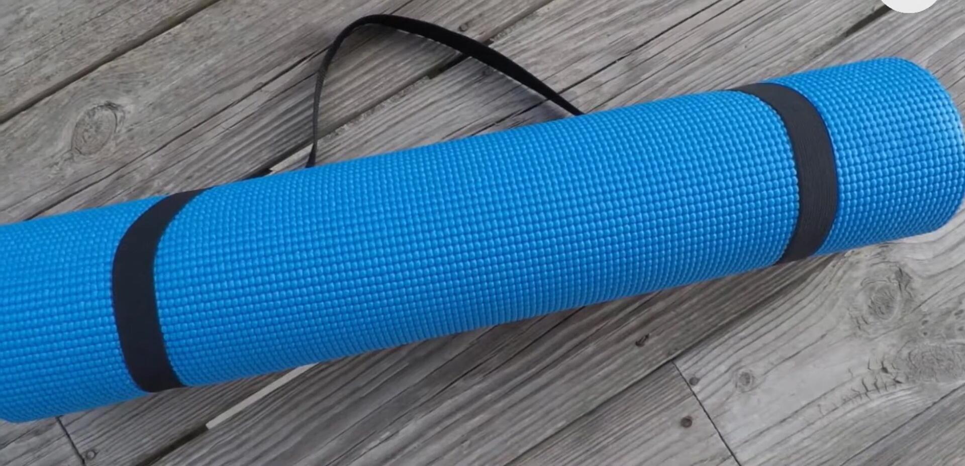 A yoga student using the GoYoga All-Purpose mat