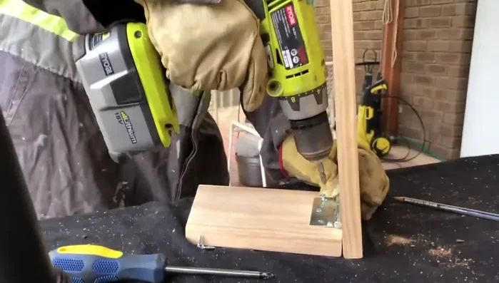 Repeat steps 5 and 6 for the second leg, ensuring both legs are facing the same direction for consistent angles.