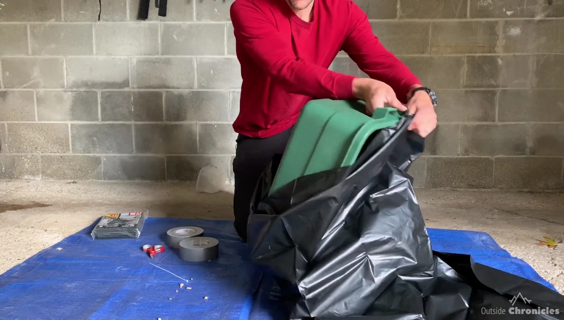 Shaping the filled garbage bag