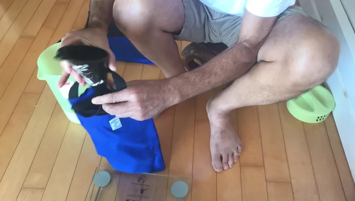 Shake the inner bag gently to settle the sand as you fill it.