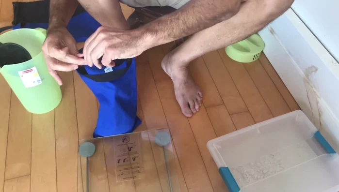 Zip the inner bag closed. Then, place the filled inner bag into the outer bag with the handle.