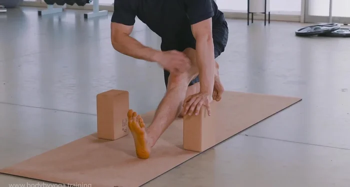 Engage top of left thigh, lifting leg away from the ground to feel active engagement in hip flexors and quadriceps. Hold, breathing deeply.