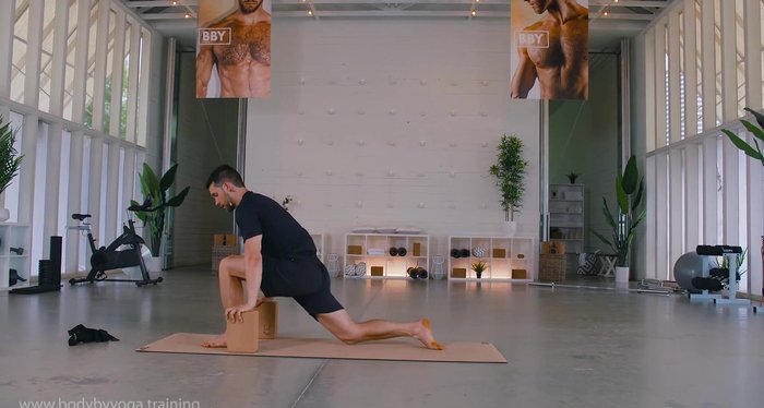 Optional: Use blocks on either side of left foot. Squeeze glutes, drive hips forward, push into left foot. Breathe.