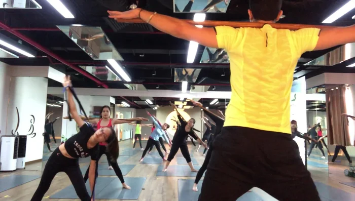 Exercise involving the use of an excavator (likely metaphorical for body positioning)