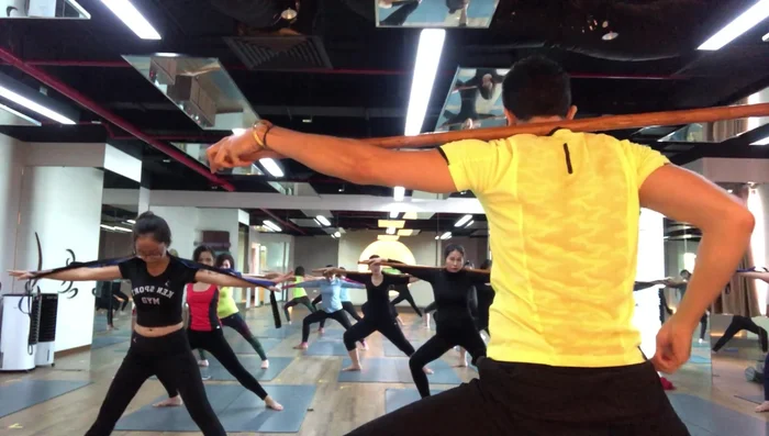 Exercise involving the use of an excavator (likely metaphorical for body positioning)