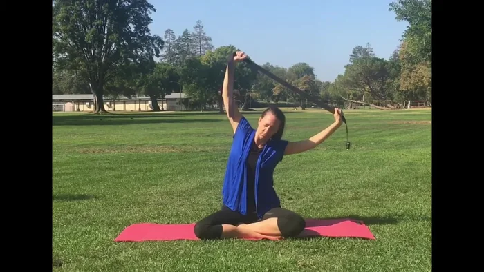 Repeat One-Armed Strap Stretch on the other side.