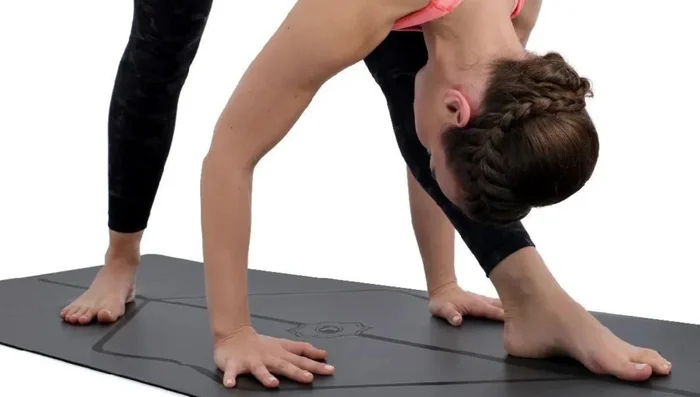 Assess texture and grip. Look for mats with sufficient grip to prevent slips, especially during challenging poses.
