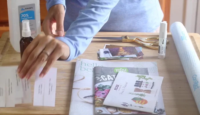 Create Labels: Clean bottles with rubbing alcohol, print labels, decorate with magazine cutouts, and attach with contact paper.