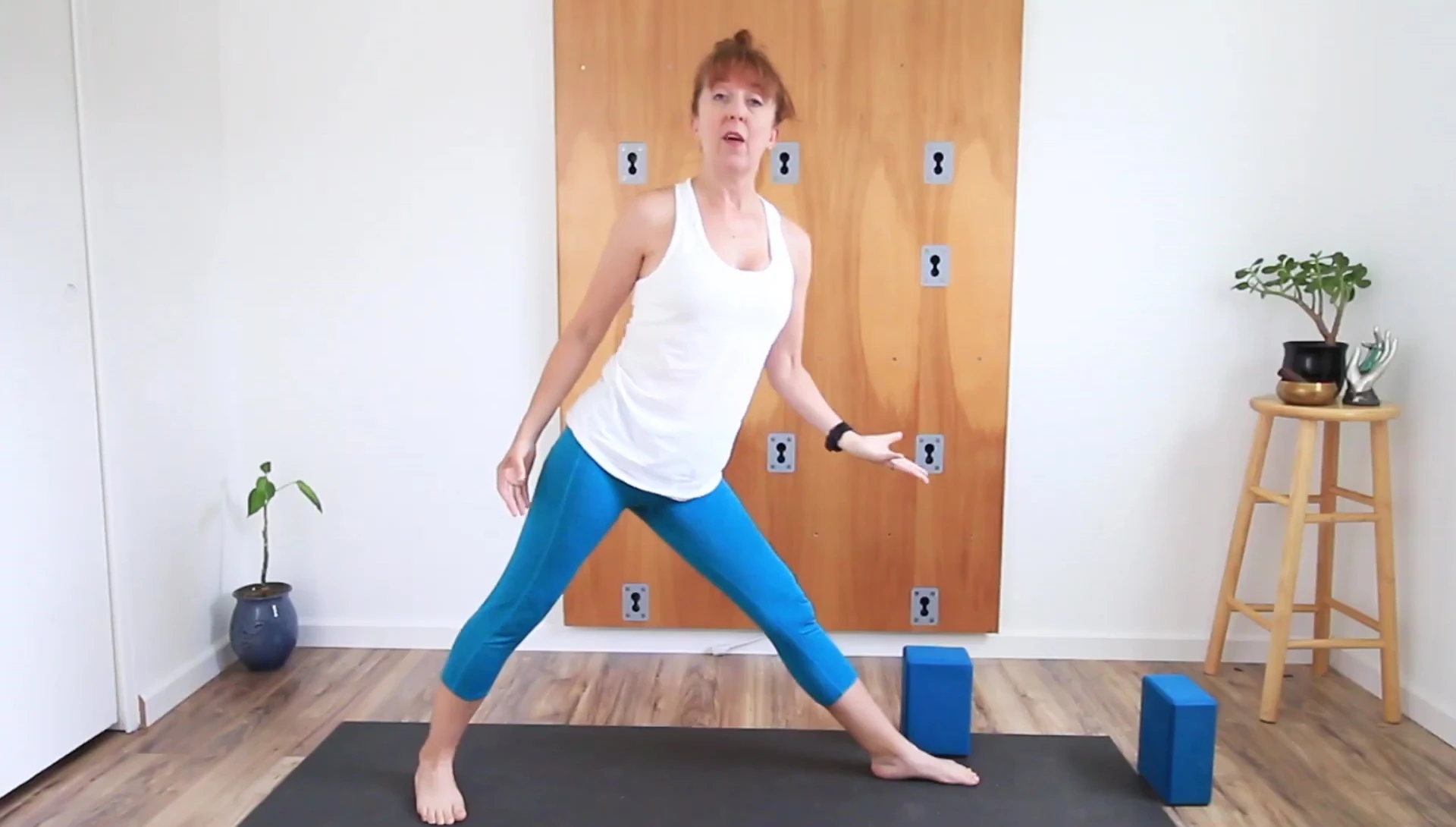 Using yoga blocks for support in a pose