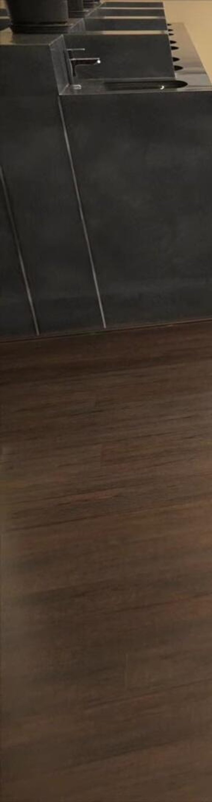 Lie down completely comfortably. Slowly pull yourself downwards until you're lying on your back.