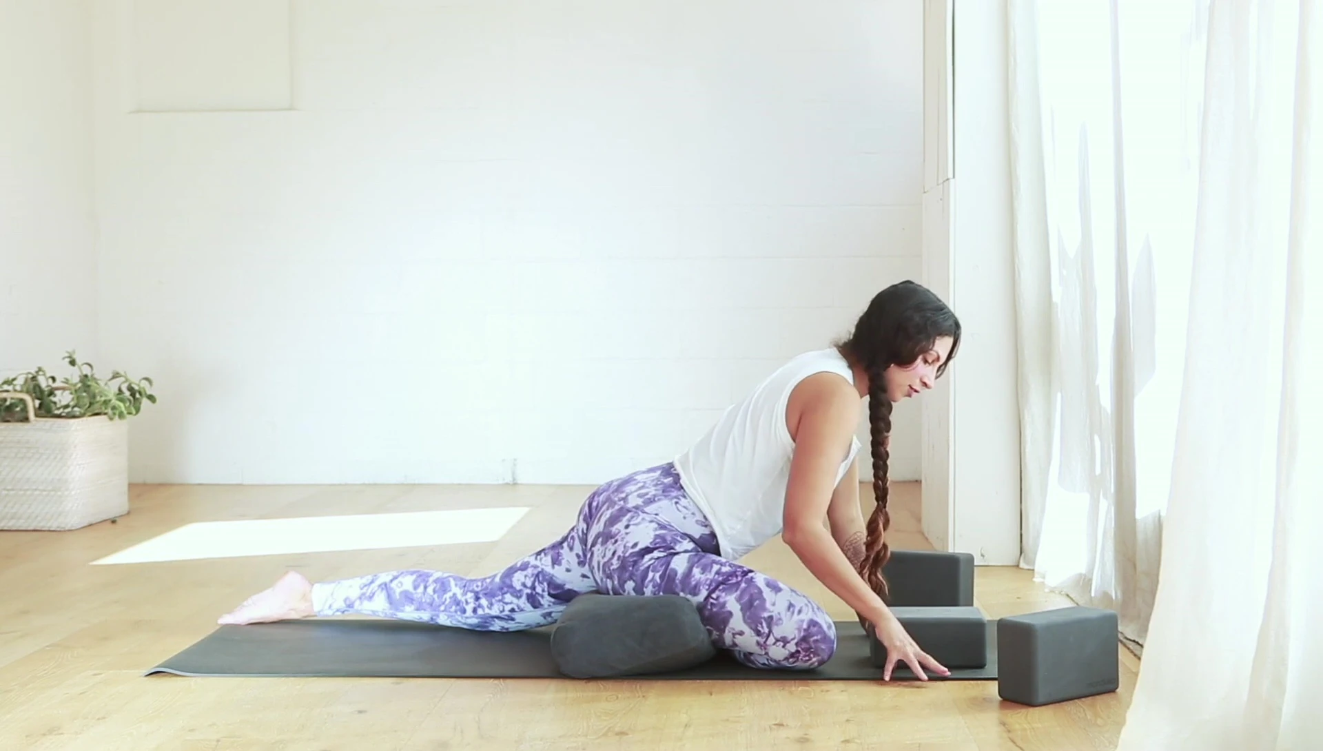 Returning to the starting position of pigeon pose