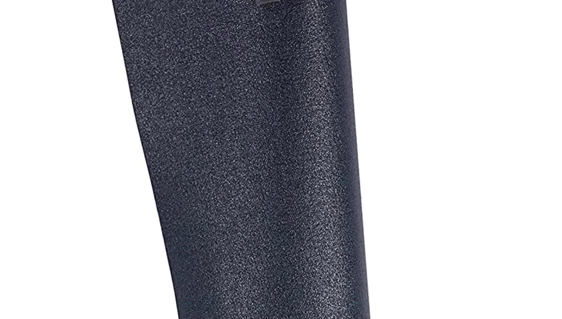 Person unrolling the Manduka eko SuperLight mat