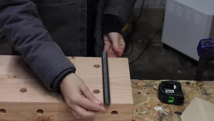 Permanently attach the vise handles to the threaded rods using thread locker.