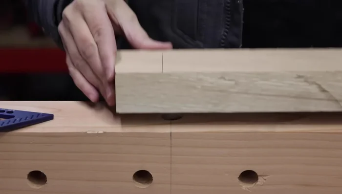 Permanently attach the vise handles to the threaded rods using thread locker.