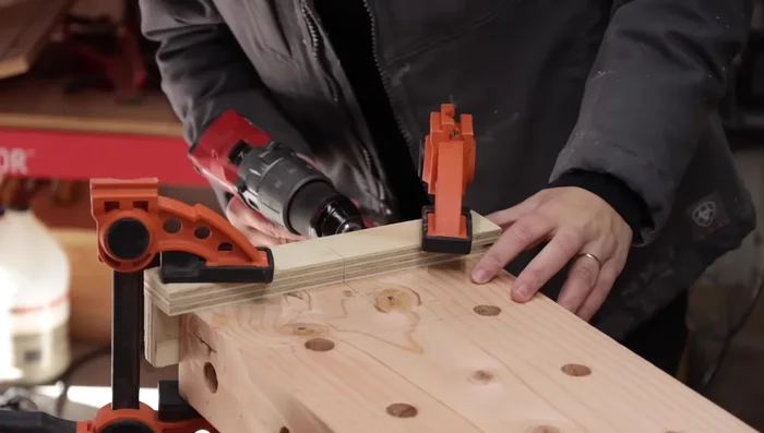 Construct raised feet for clamping the bench to various surfaces.