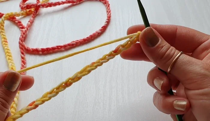 Turn your work and double crochet in the same space as the previous stitches, creating a neat row.